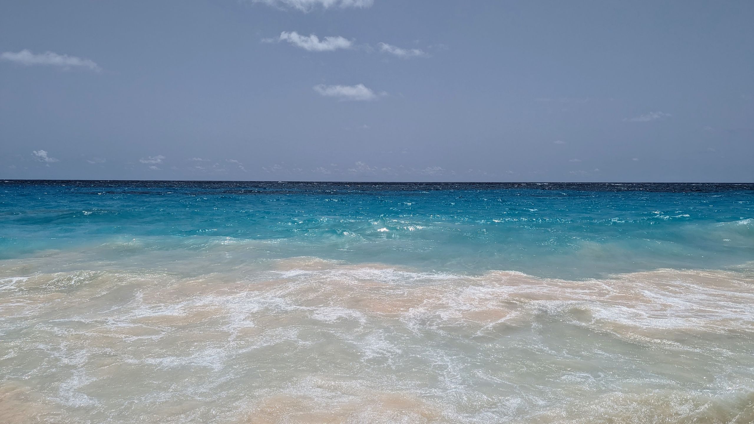 Waves crashing on the beach in Bermuda
